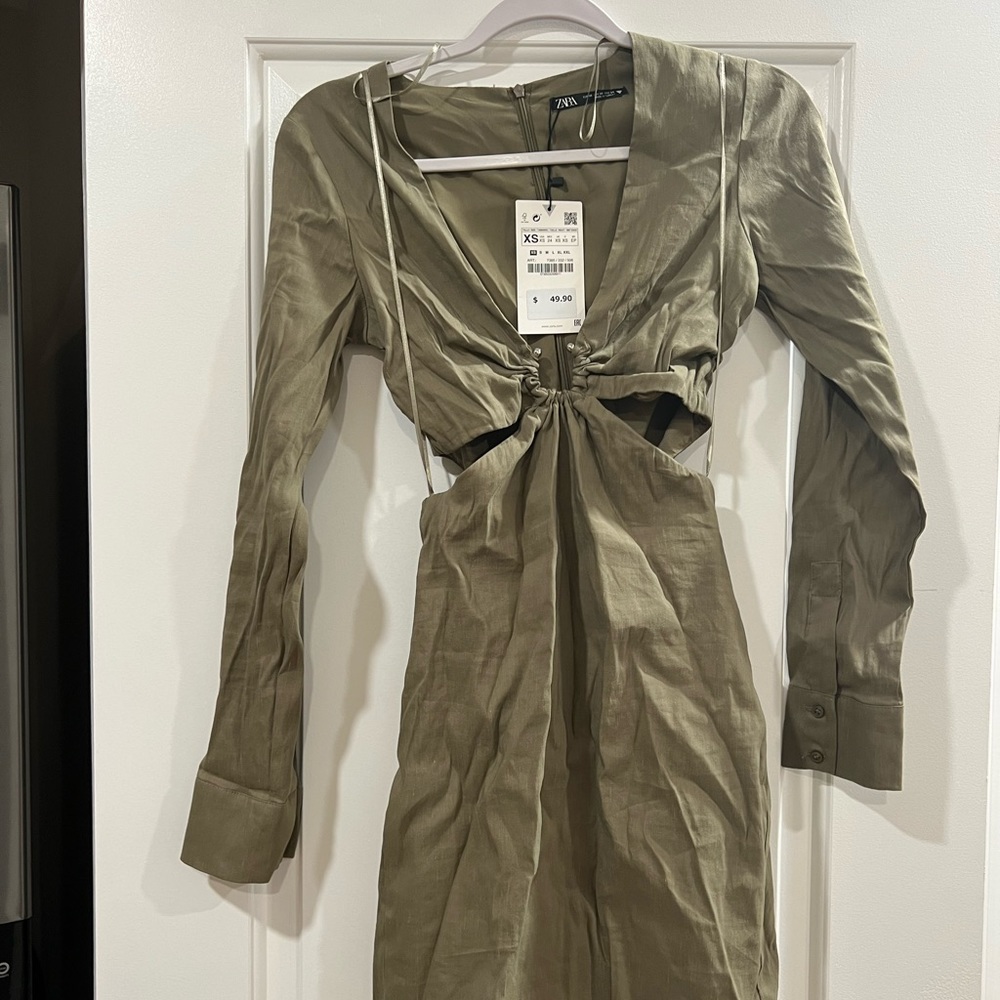 Zara green mini dress with cutouts. Size XS